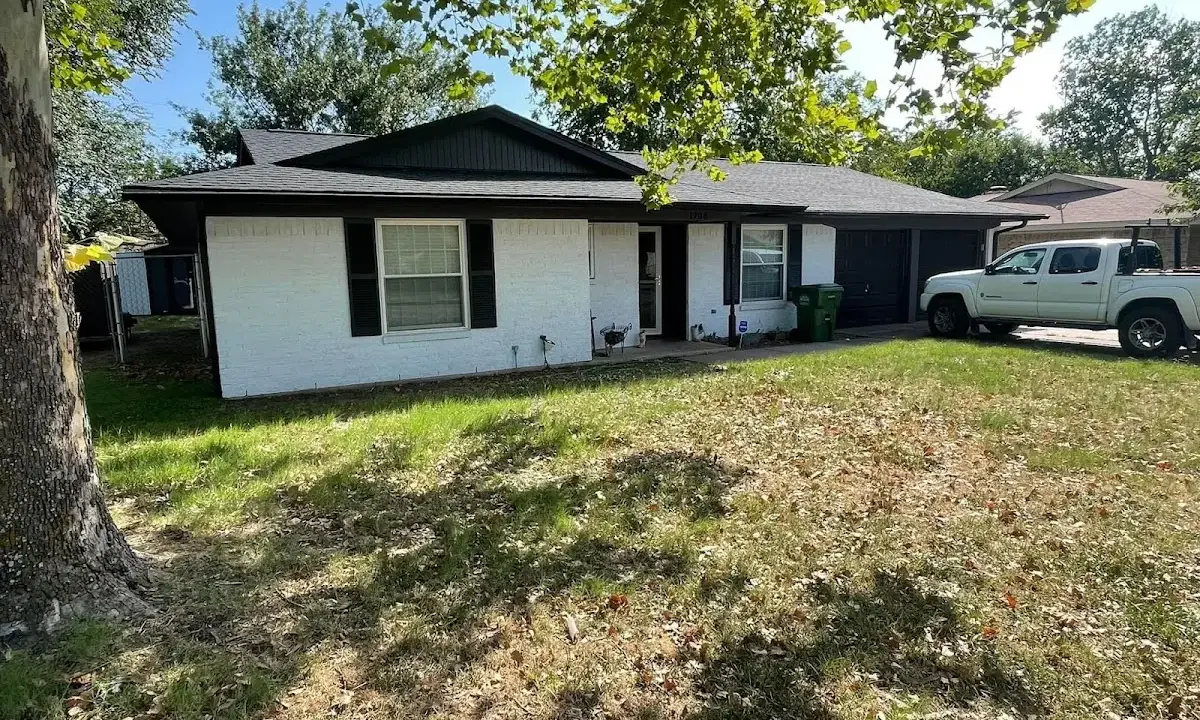 Professional roofing crew working on a residential roof in Goodlettsville